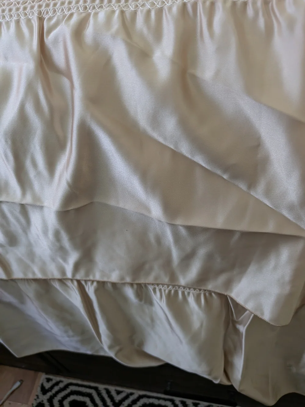 Elegant Cream Quilted Bedspread with Embroidered Rust Floral Accents